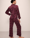 Model wears Inez Washable Silk Printed Long PJ Set in Winter Bloom Cabernet/Navy.