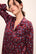 Model wears Inez Washable Silk Printed Long PJ Set in Winter Bloom Cabernet/Navy.