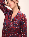 Model wears Inez Washable Silk Printed Long PJ Set in Winter Bloom Cabernet/Navy.