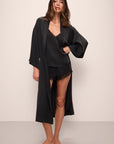 Model wears Inez Washable Silk Robe in Black.