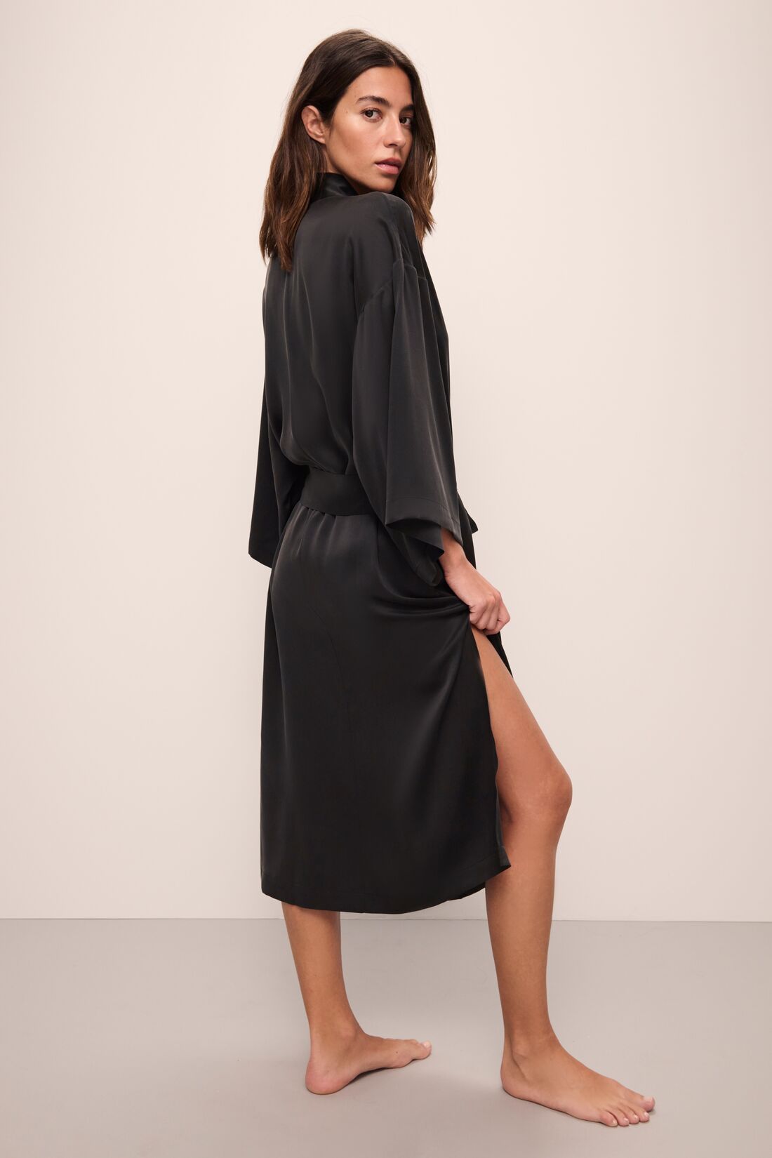 Model wears Inez Washable Silk Robe in Black.