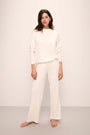 Model wears Cozy Time Wide Leg Pant in Ivory.