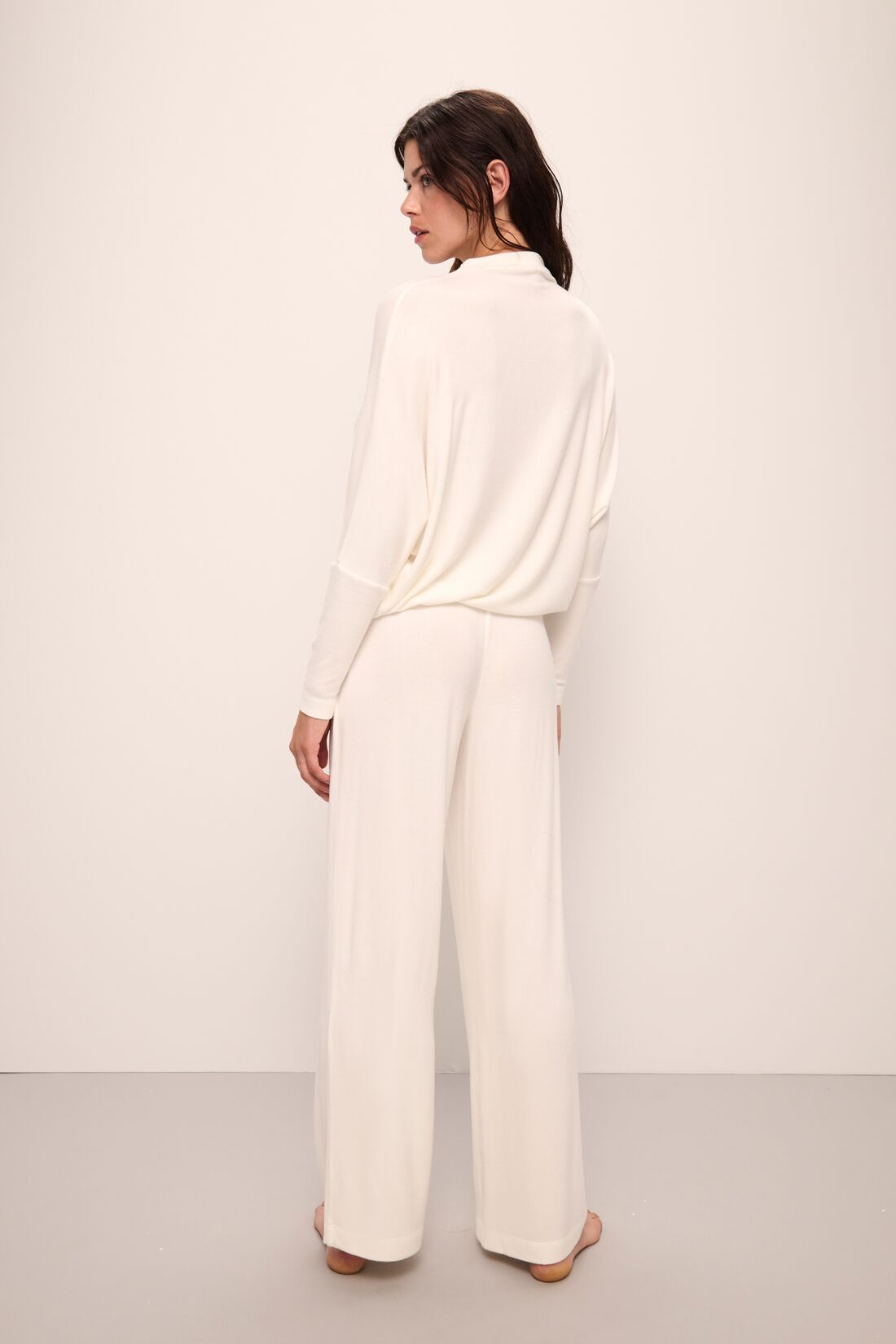 Model wears Cozy Time Wide Leg Pant in Ivory.