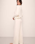 Model wears Cozy Time Wide Leg Pant in Ivory.