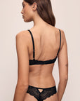 Back image of model wearing Lara Thong in black