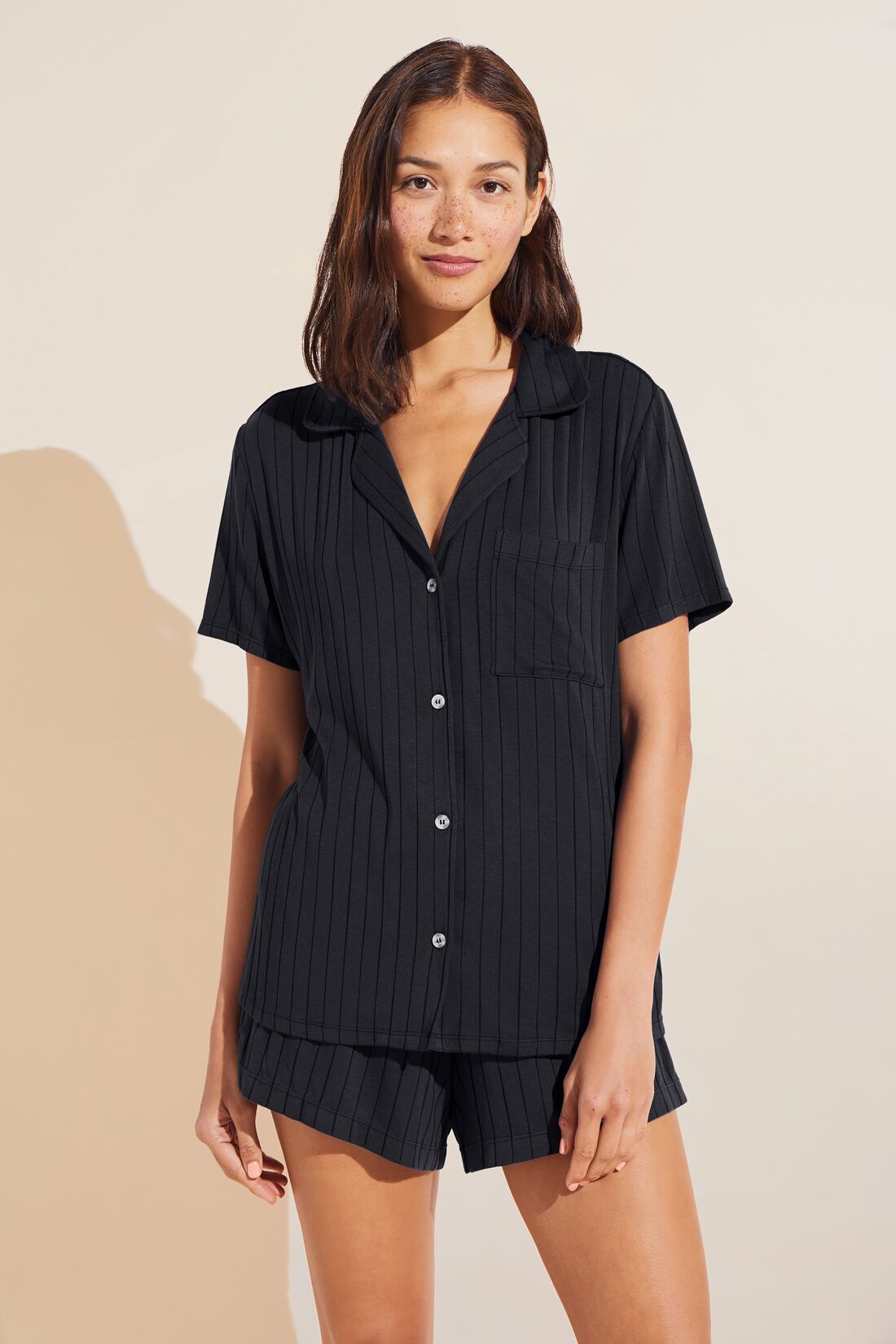 Model wears Gisele TENCEL™ Modal Rib Relaxed Short PJ Set in Black.