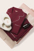 Image of the Perfect Gift Bundle which includes Gisele Long PJ set, sherpa slippers and a self care item