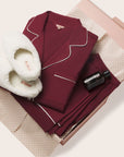 Image of the Perfect Gift Bundle which includes Gisele Long PJ set, sherpa slippers and a self care item