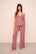 Model is wearing Gisele TENCEL™ Modal Cami & Pant PJ Set  in  Berry Blush
