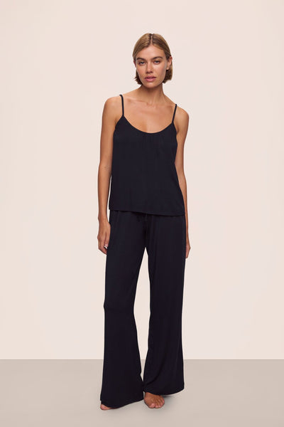 Model is wearing Gisele TENCEL™ Modal Cami & Pant PJ Set in Black