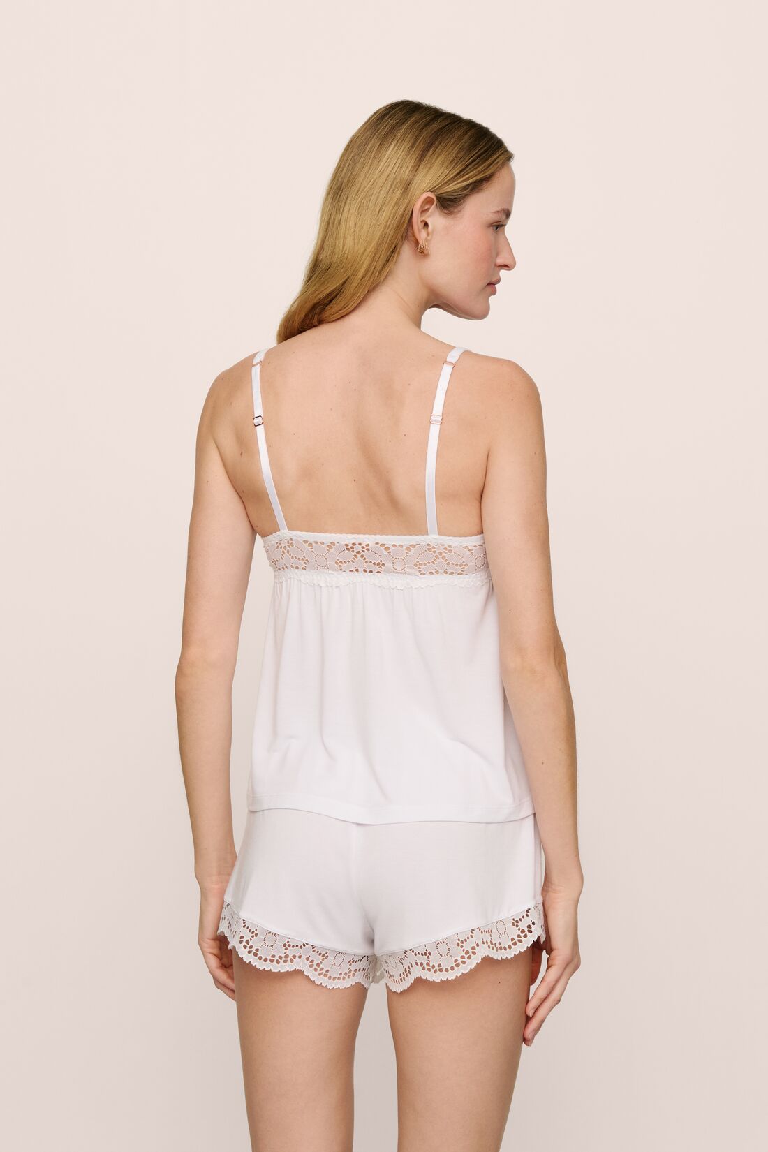 Model is wearing the Beatrix TENCEL™ Modal Cami & Short PJ Set in White