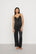 Model is wearing Washable Silk with Lace Embroidery Cami & Pant PJ Set in Black