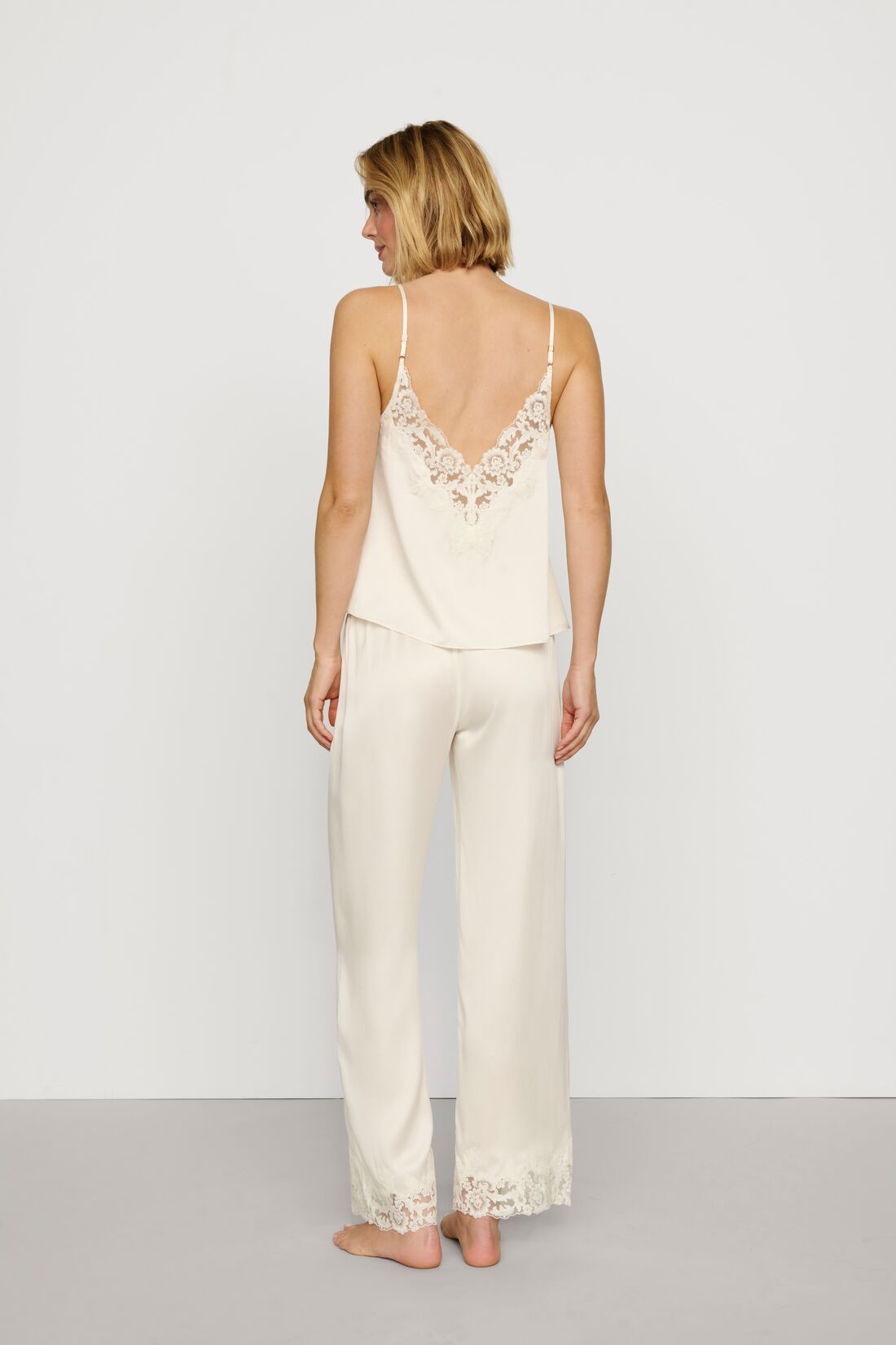 Model is wearing Washable Silk with Lace Embroidery Cami & Pant PJ Set in Ivory