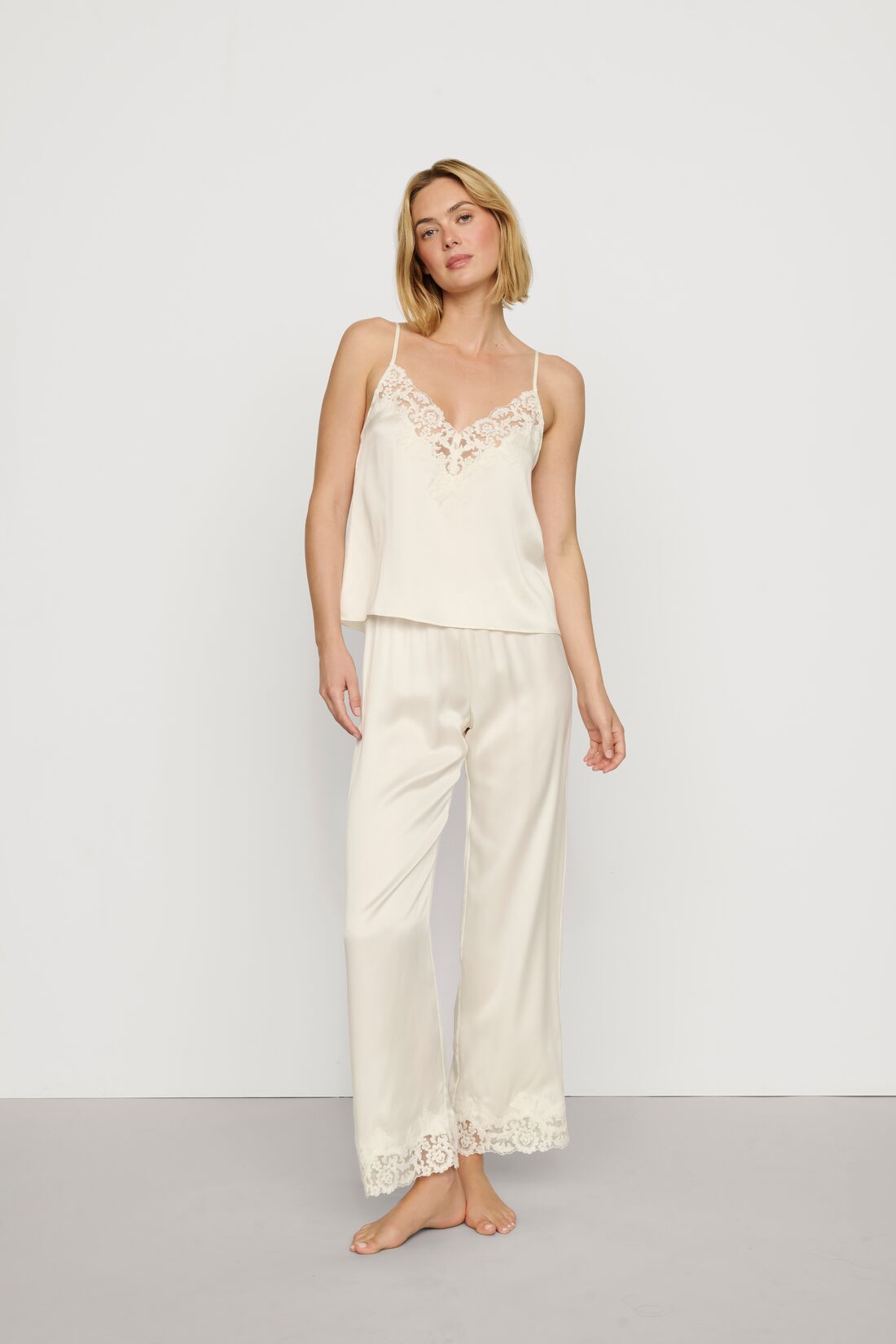 Model is wearing Washable Silk with Lace Embroidery Cami & Pant PJ Set in Ivory