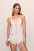 Model is wearing Mariana Romper in White