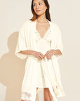 Model wears Rosalia TENCEL™ Modal Robe in Ivory.