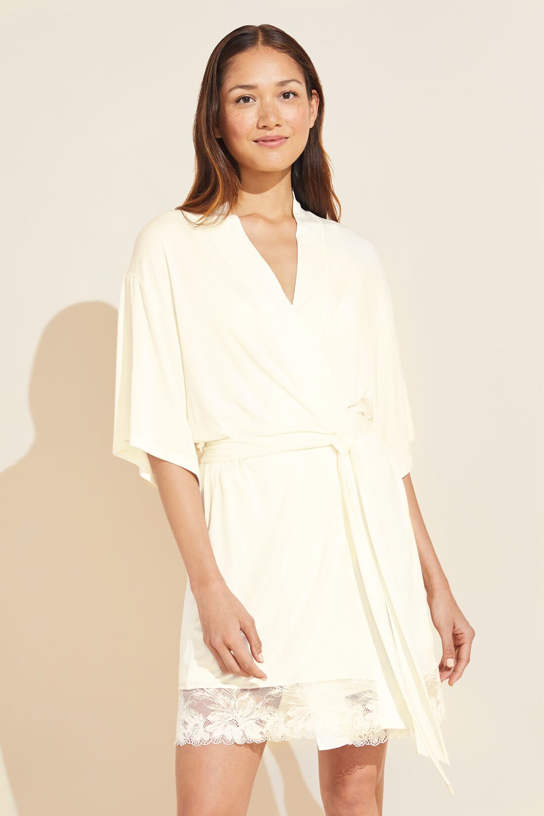 Model wears Rosalia TENCEL™ Modal Robe in Ivory.