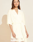 Model wears Rosalia TENCEL™ Modal Robe in Ivory.