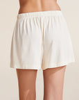 Model wears Gisele TENCEL™ Modal Everyday Relaxed Short in Ivory.