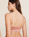 Model wears Flora TENCEL™ Modal Front Closure Bralette in Pink Rouge/Rose.