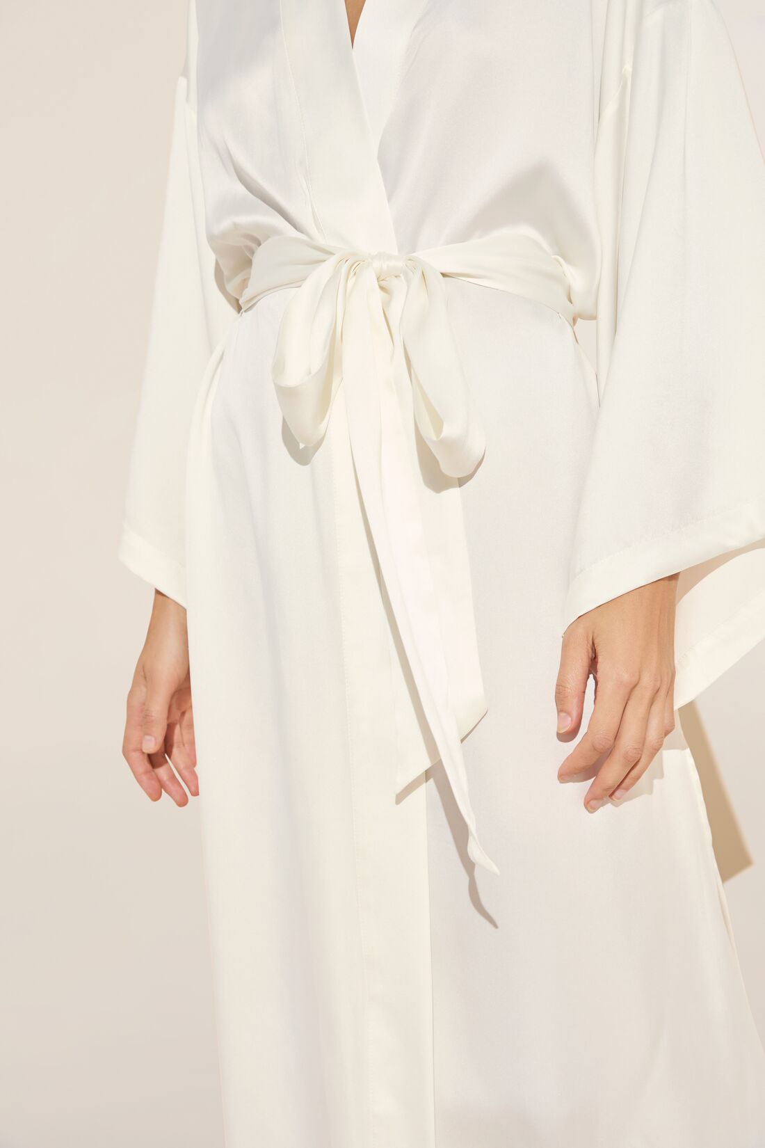 Model wears Inez Washable Silk Robe in Ivory.