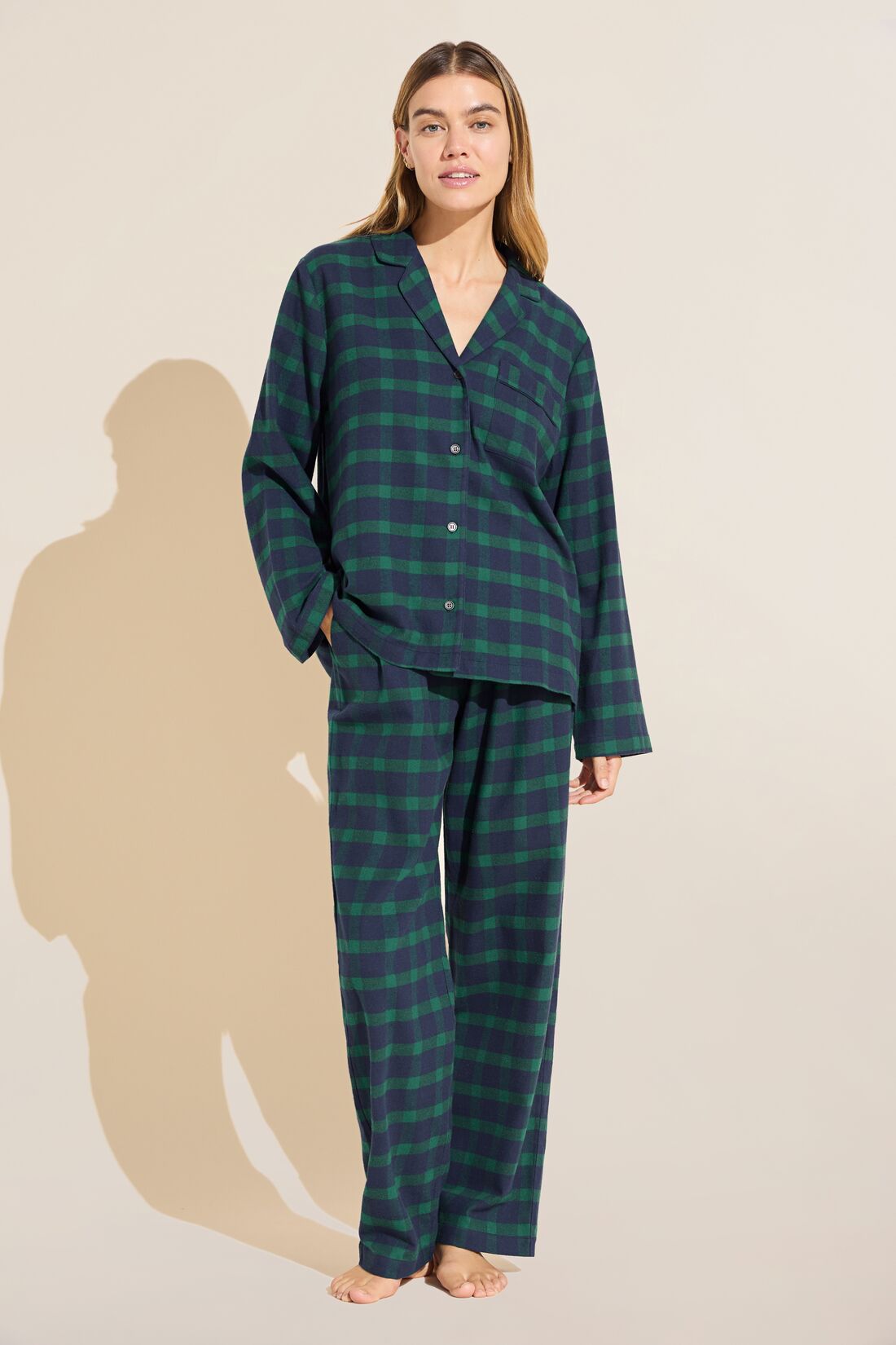 Model wears Flannel Long PJ Set in green and navy plaid.