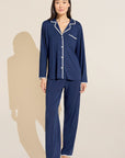 Model wears Frida TENCEL™ Modal Long PJ Set in Navy/Ivory.