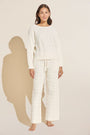 Model wears Cable Knit Recycled Sweater Straight Leg Pant in Ivory.