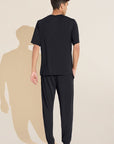 Model wears Henry TENCEL™ Modal Short Sleeve & Pant PJ Set in Black.