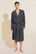 Model wears William TENCEL™ Modal Robe in Charcoal Heather/Ivory.