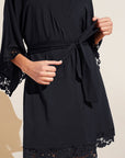 Model wears Naya TENCEL™ Modal Robe in Black.