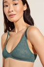 Model wears Soft Stretch Recycled Lace Plunge Bralette in Agave.