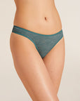 Model wears Soft Stretch Recycled Lace Thong in Agave.