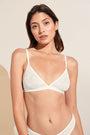 Model wears Soft Stretch Recycled Lace Triangle Bralette in Ivory.