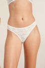 Model wears Soft Stretch Recycled Lace High Leg Brief in Ivory.