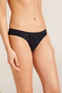 Model wears Soft Stretch Recycled Lace High Leg Brief in Black.