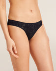 Model wears Soft Stretch Recycled Lace High Leg Brief in Black.