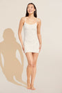 Model wears Soft Stretch Recycled Lace Slip in Ivory.