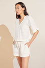 Model wears Crinkle Woven Short Sleeve Top & Short Set in Ivory/Canyon Sunset.