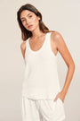 Model is wearing Gisele TENCEL™ Modal Everyday Tank in ivory.