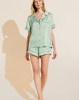 Model wears Inez Washable Silk Short PJ Set in Surf Spray/Agave.