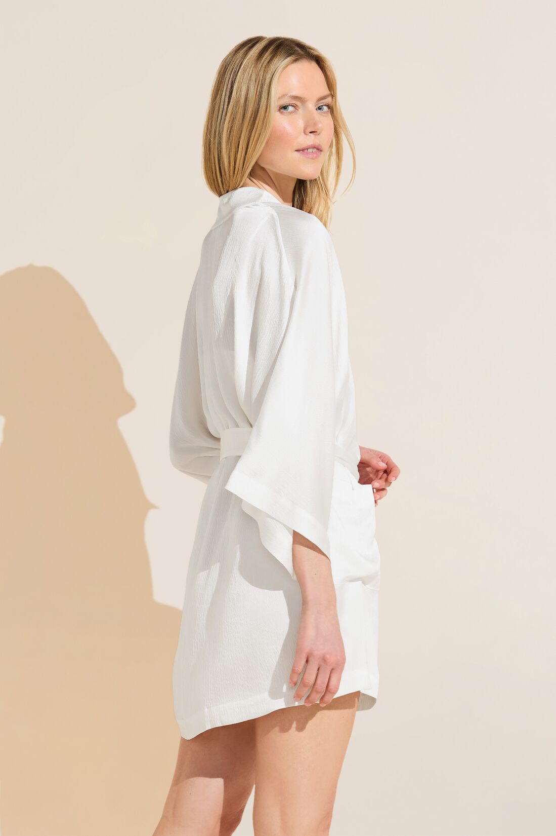 Model wears Inez Textured Washable Silk Short Robe in Pearl.