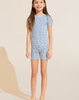 Model wears Kids Printed TENCEL™ Modal Unisex Short PJ Set in Double Diamond Denim Blue/Ivory.