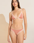 Model wears Flora TENCEL™ Modal Front Closure Bralette in Pink Rouge/Rose.