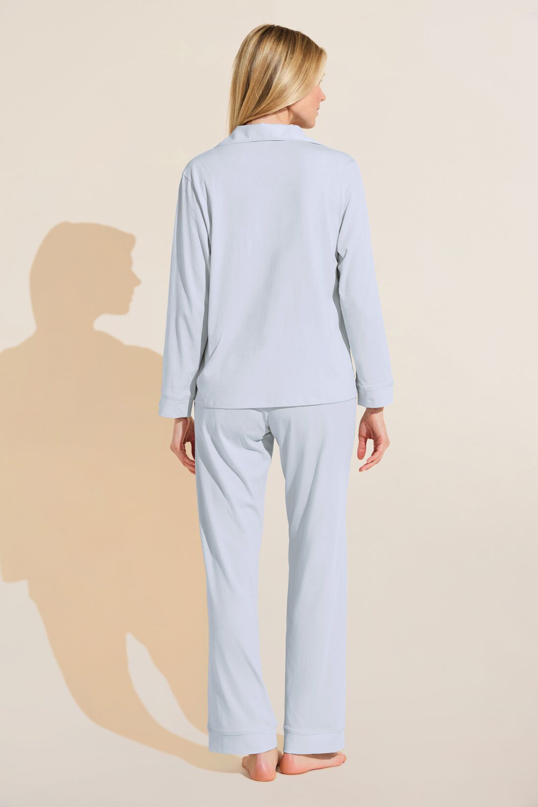 Model wears Organic Pima Cotton Notch Collar Top & Pant PJ Set in Ice Blue.