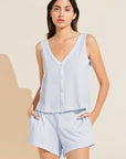 Model wears Organic Pima Cotton Tank & Short PJ Set in Ice Blue.