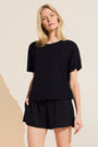 Model wears Organic Linen Knit Short Sleeve T-Shirt in Black.