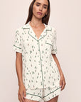 Model wears the Gisele Printed TENCEL™ Modal Relaxed Short PJ Set in Alpine Skier Ivory/Forest Green.