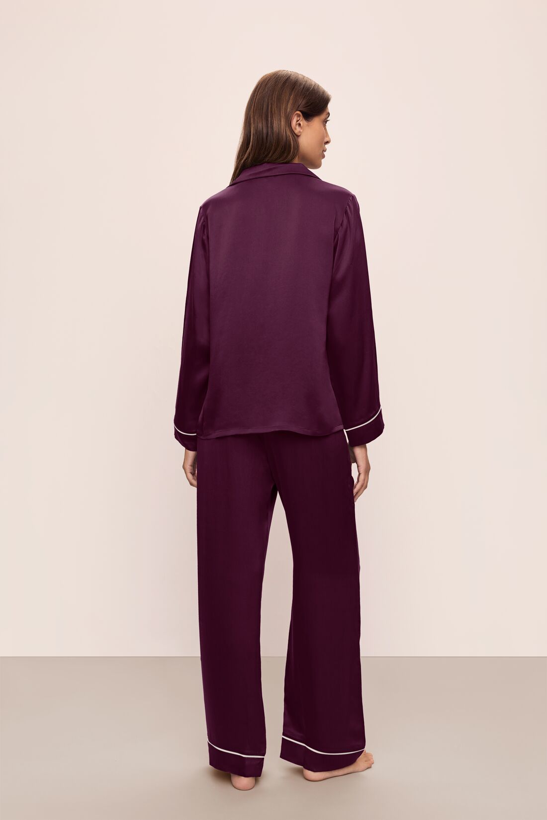 Model wears Inez Washable Silk Long PJ Set in Plum/Ivory.