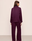 Model wears Inez Washable Silk Long PJ Set in Plum/Ivory.